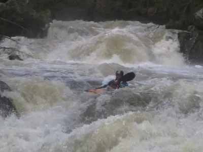 L'avaloir en arrière plan. Antoine à l'entrée du passage suivant.